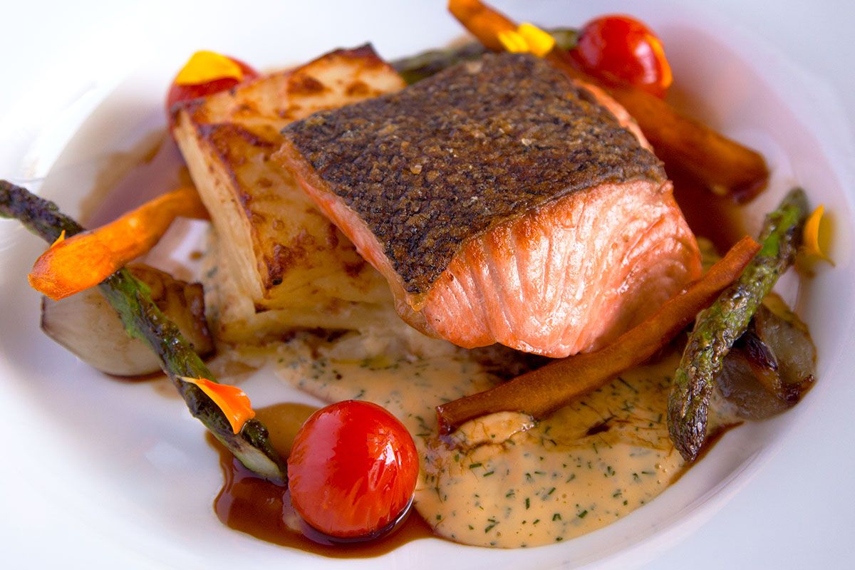 Crispy skin salmon with potato, asparagus and cherry tomatoes